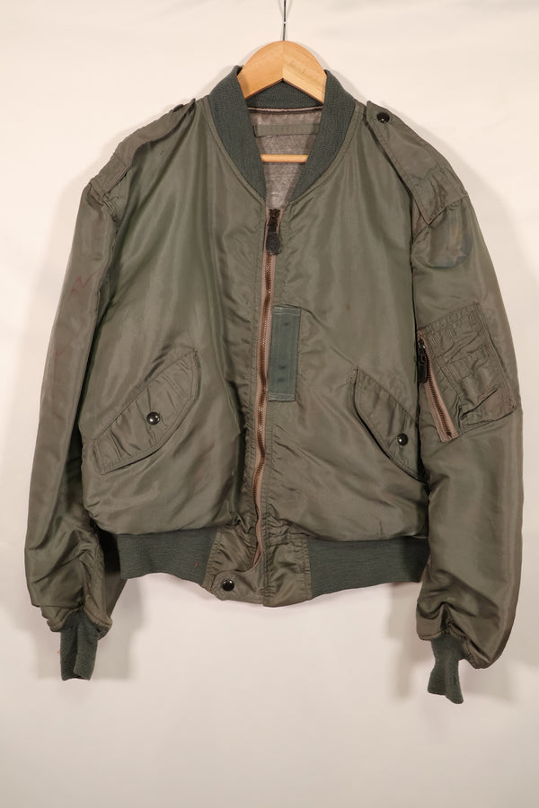 Real 1950s lot USAF L2-B flight jacket without size label, dirty and scratched, used.