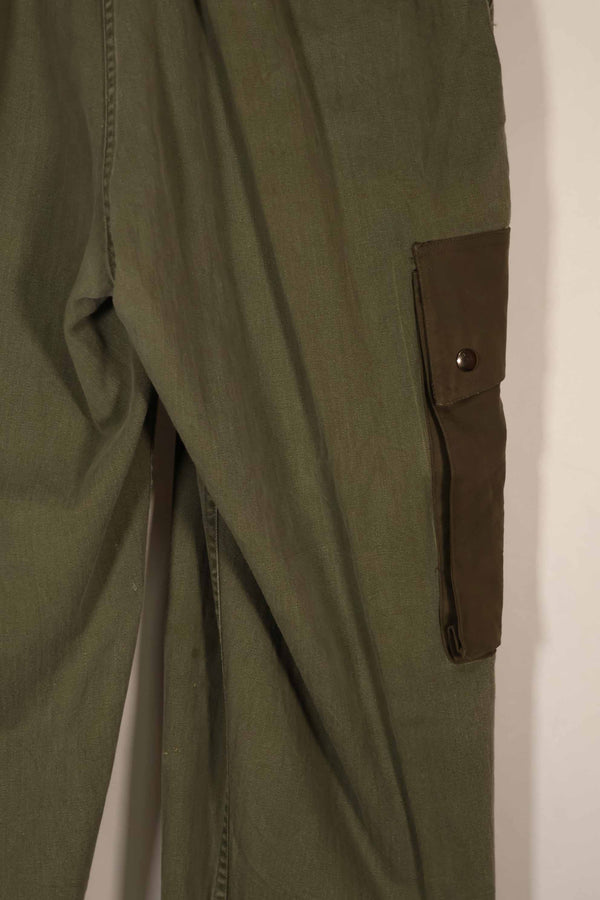 Real 1940s-50s US Army HBT pants, modified pockets, used.