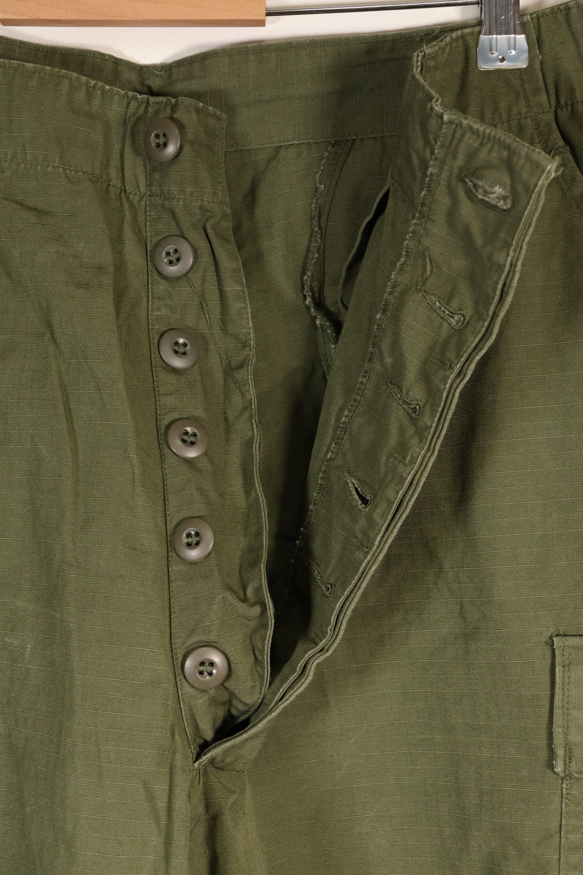 1967 Contract L-L 4th Model Jungle Fatigue Pants in good condition, faded, used.