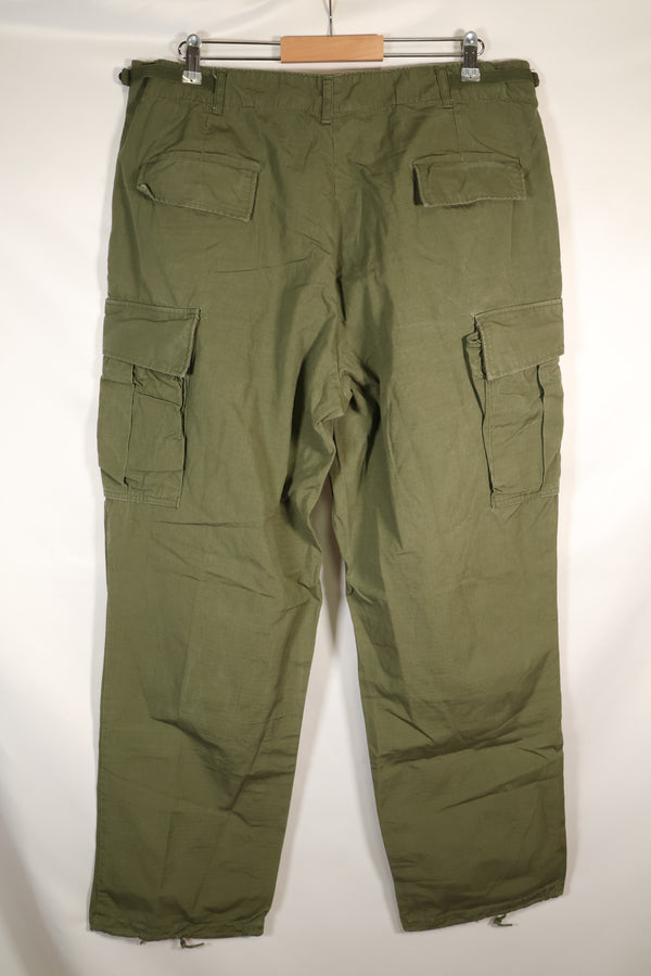 1967 Contract L-L 4th Model Jungle Fatigue Pants in good condition, faded, used.