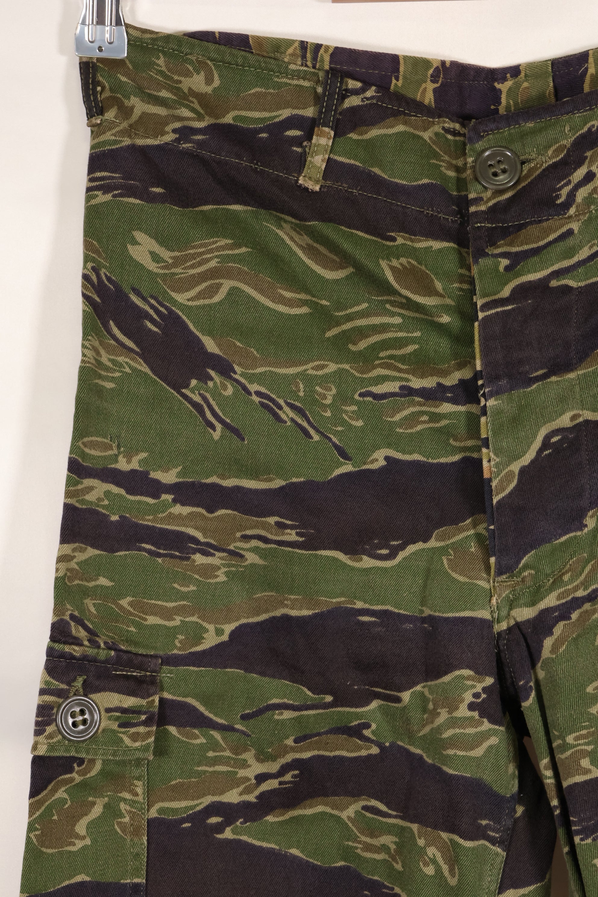 Real tiger stripe pants, gold tiger derived pattern, missing button, almost unused.