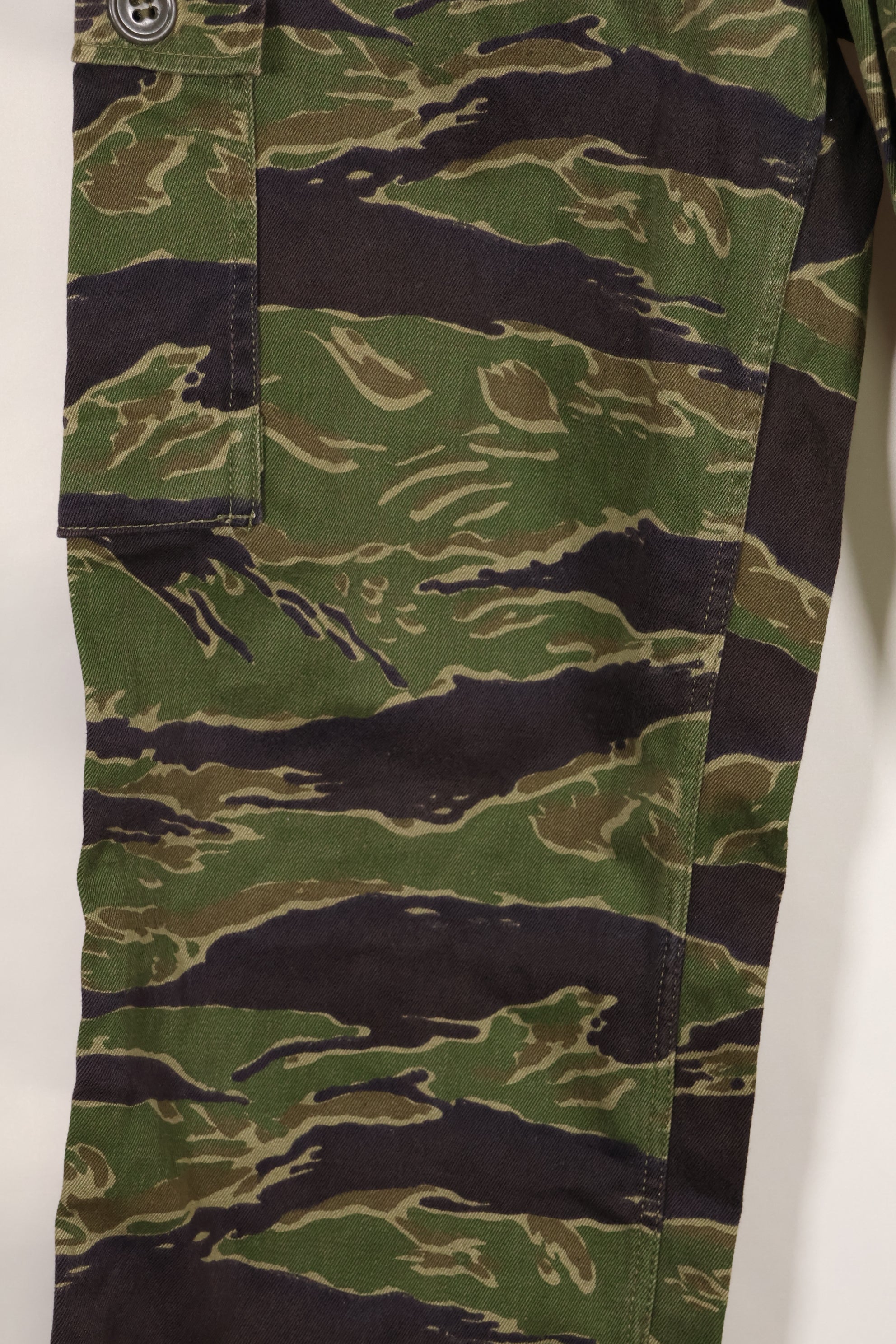 Real tiger stripe pants, gold tiger derived pattern, missing button, almost unused.