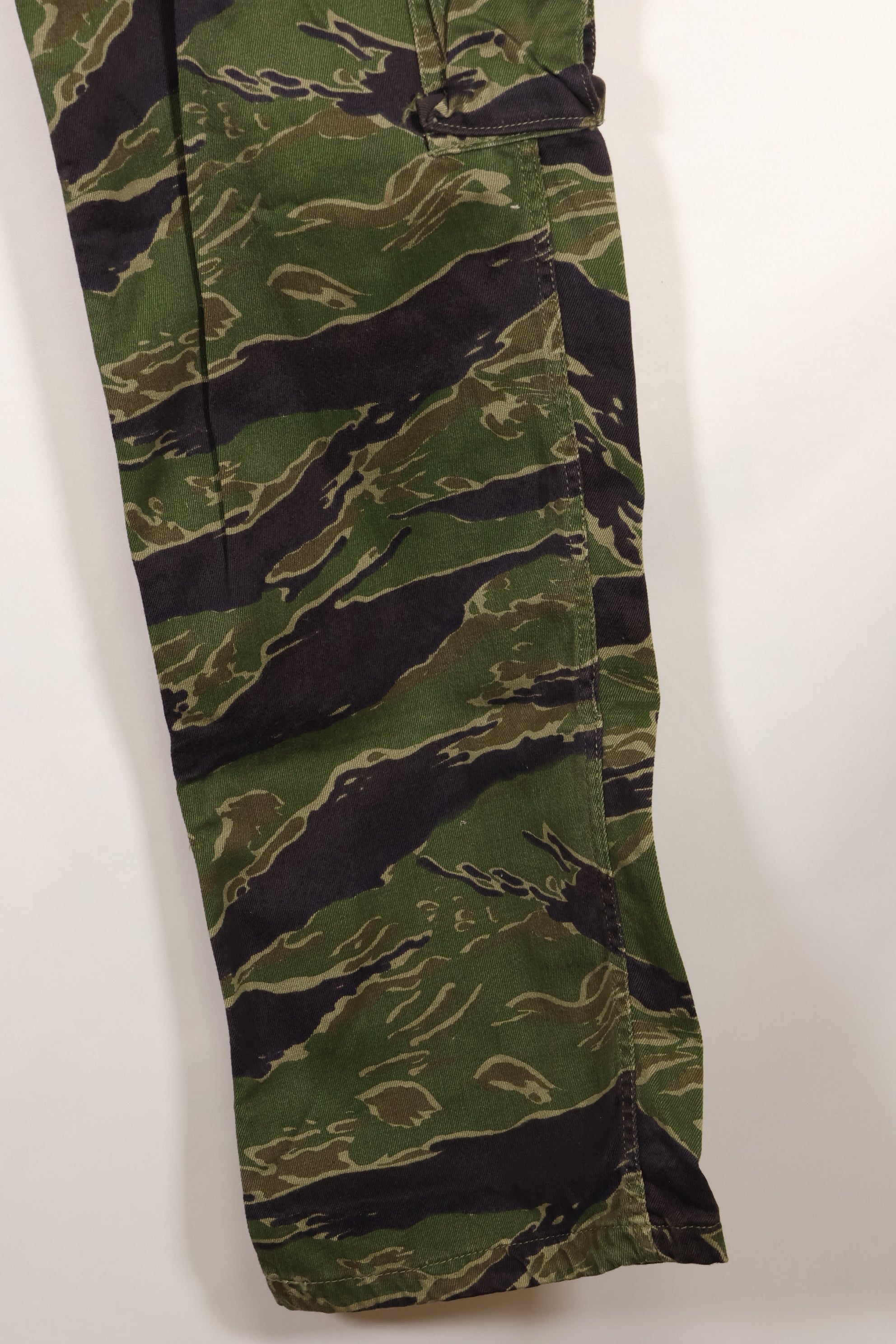 Real tiger stripe pants, gold tiger derived pattern, missing button, almost unused.