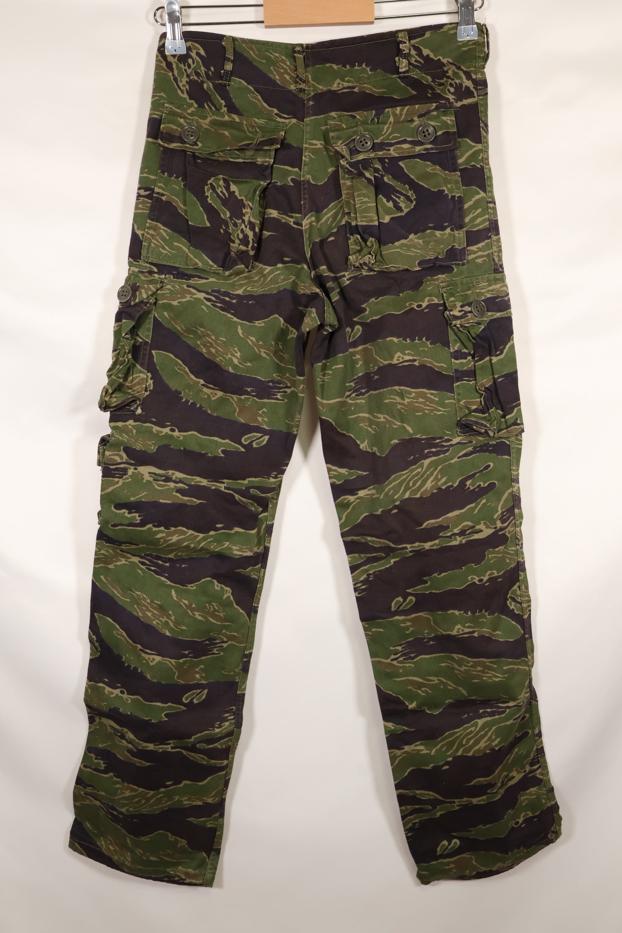 Real tiger stripe pants, gold tiger derived pattern, missing button, almost unused.