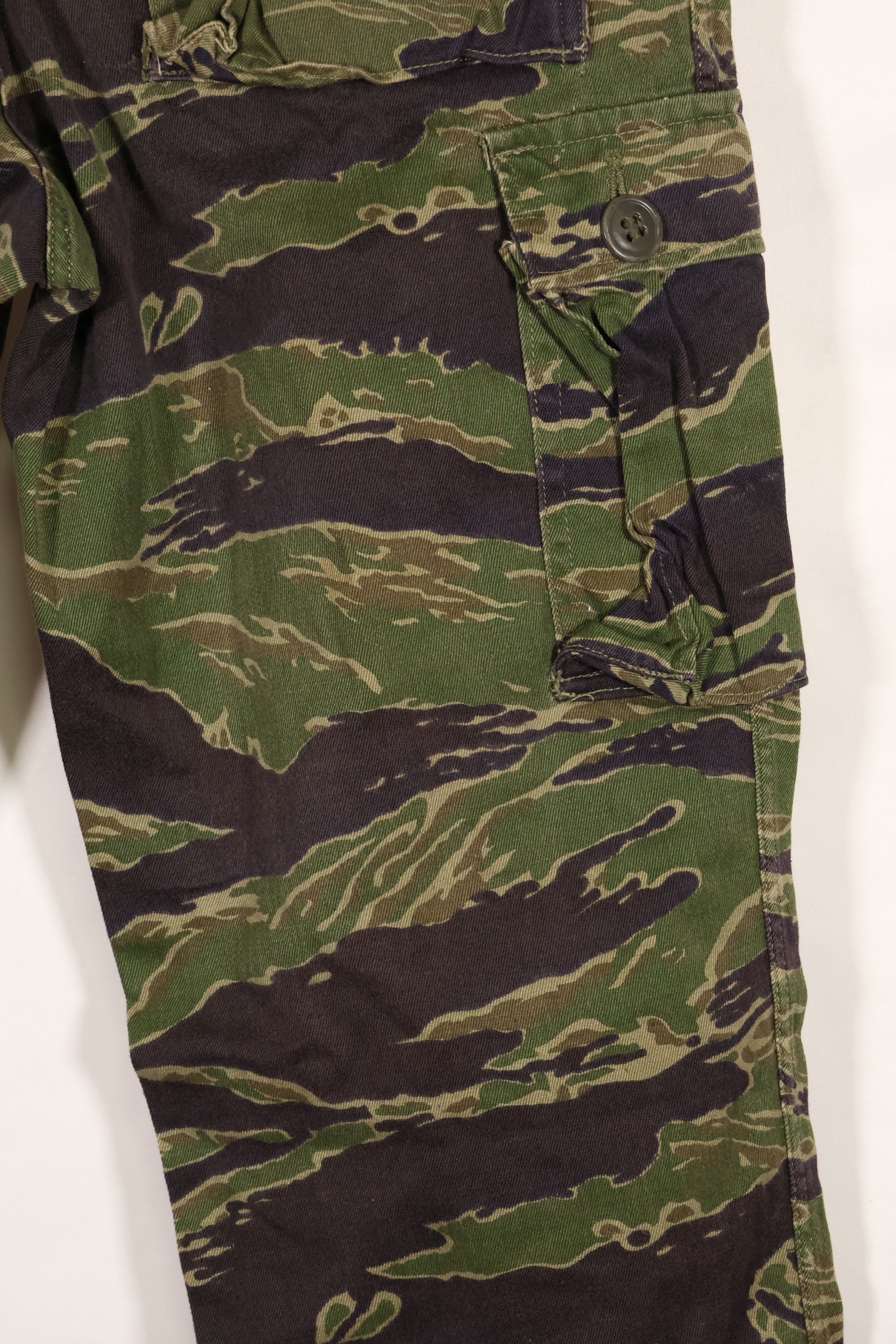 Real tiger stripe pants, gold tiger derived pattern, missing button, almost unused.