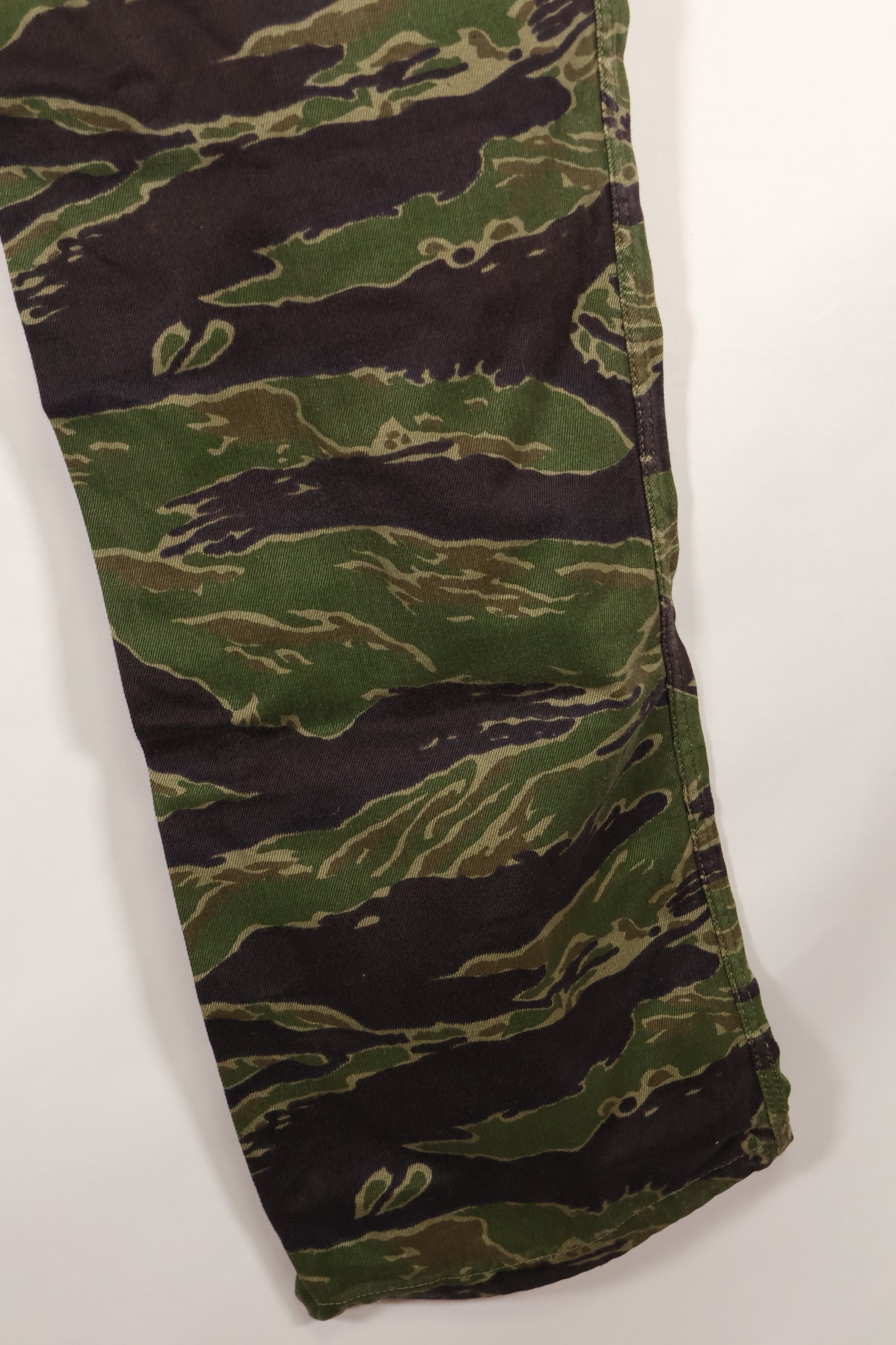 Real tiger stripe pants, gold tiger derived pattern, missing button, almost unused.
