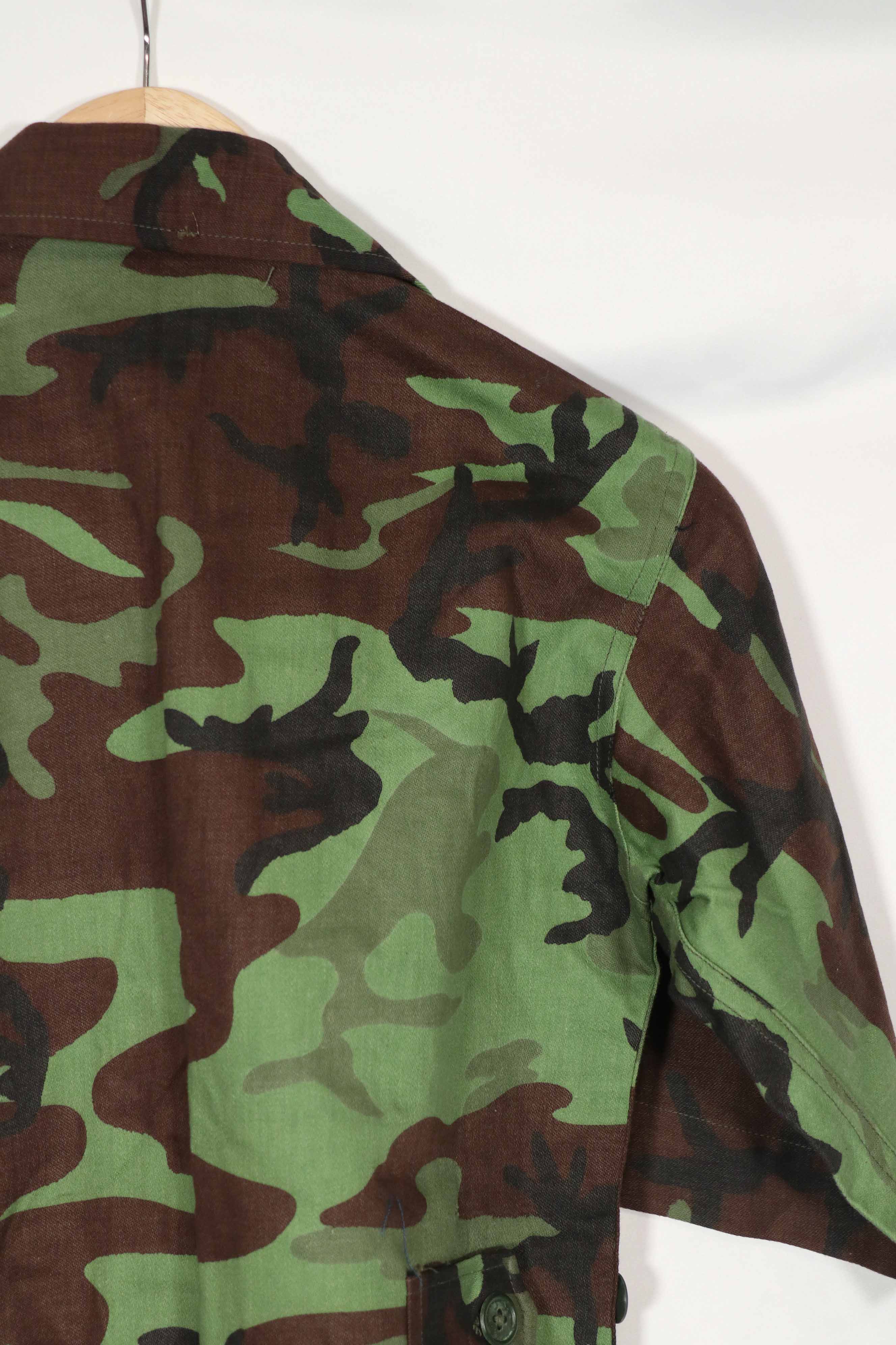 Real Unused South Vietnamese Ranger leaf camouflage jacket with short sleeves.