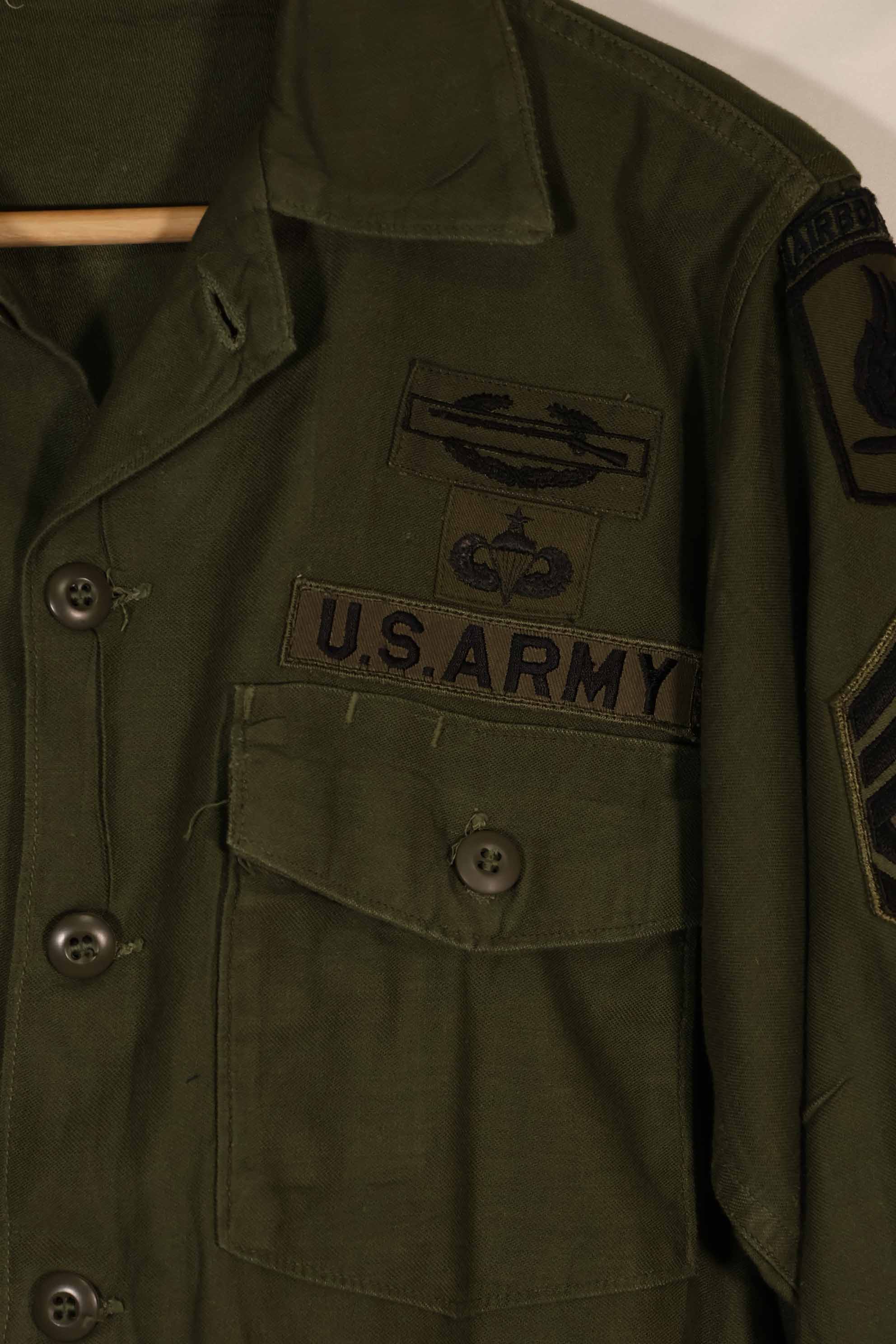 Real 1970 OG-107 utility shirt with Army Airborne insignia, used.