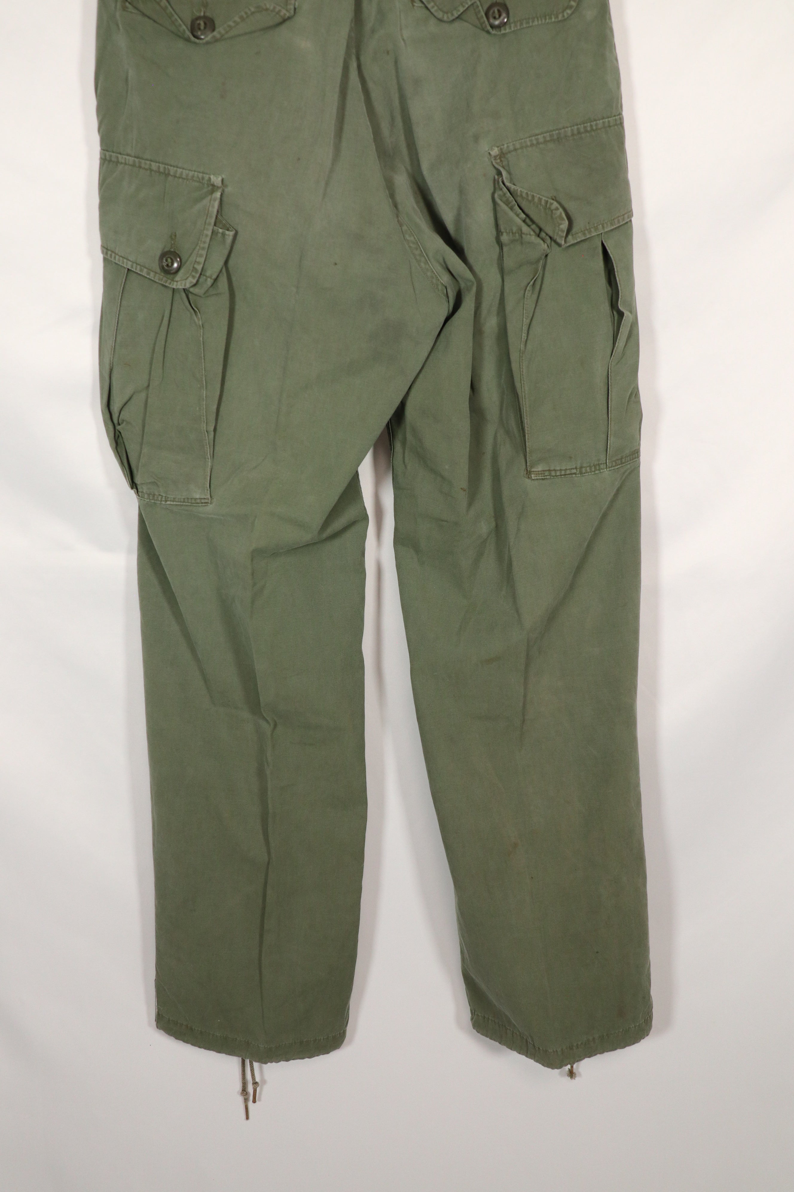 Real 1963 1st Model Jungle Fatigue Pants without leg ties, used.