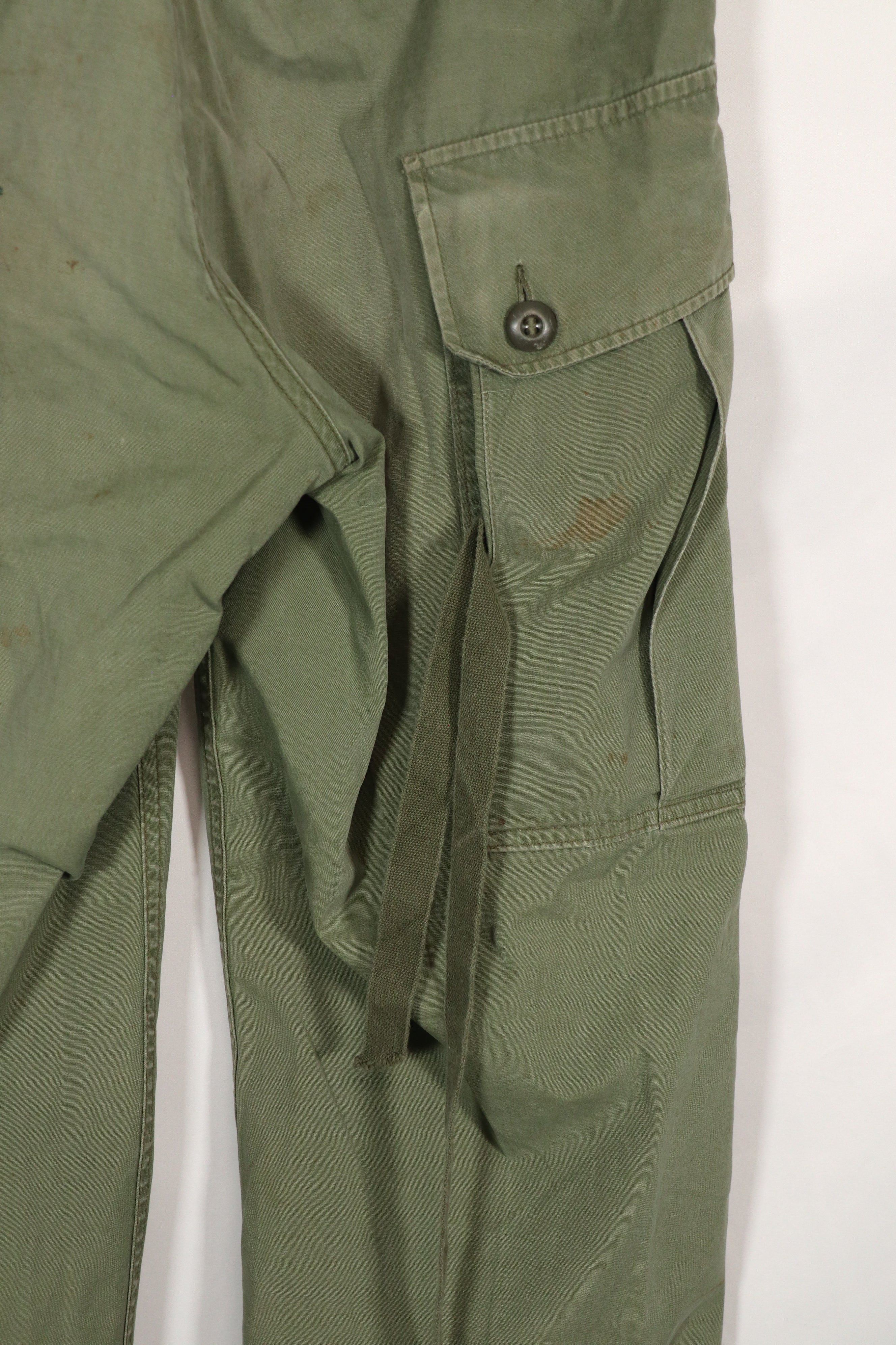 Real 1963 1st Model Jungle Fatigue Pants with leg ties, used.