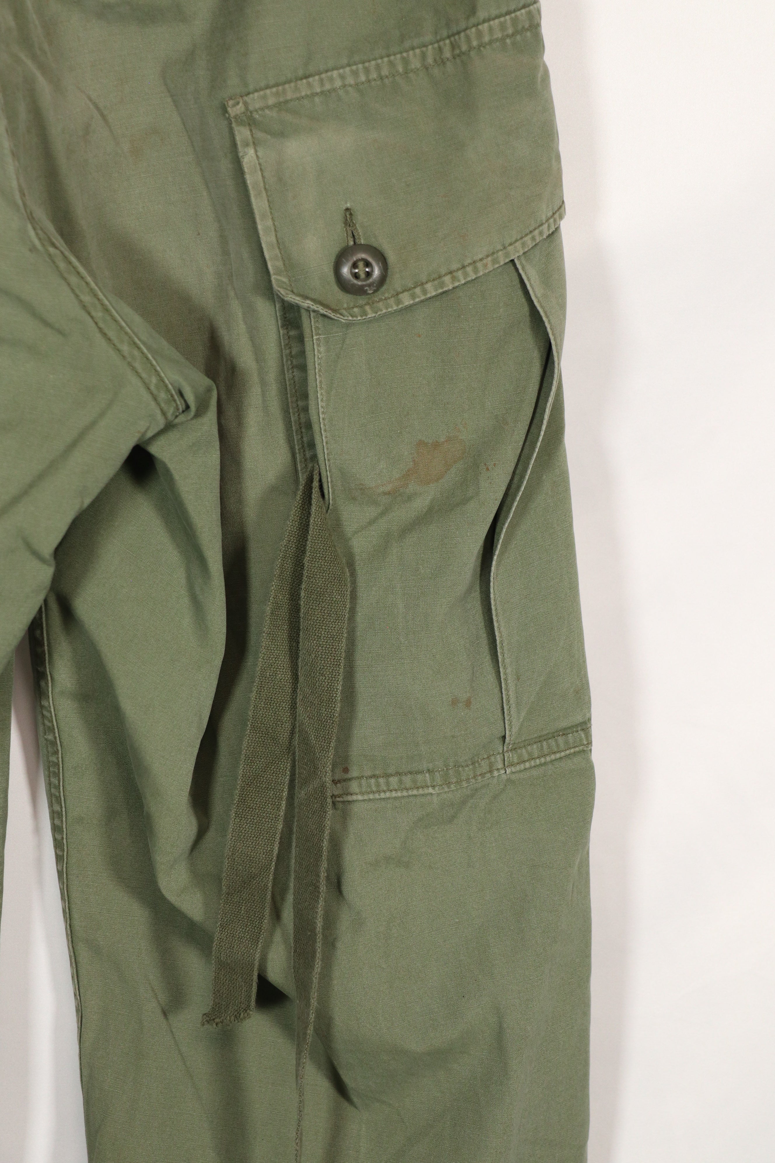 Real 1963 1st Model Jungle Fatigue Pants with leg ties, used.