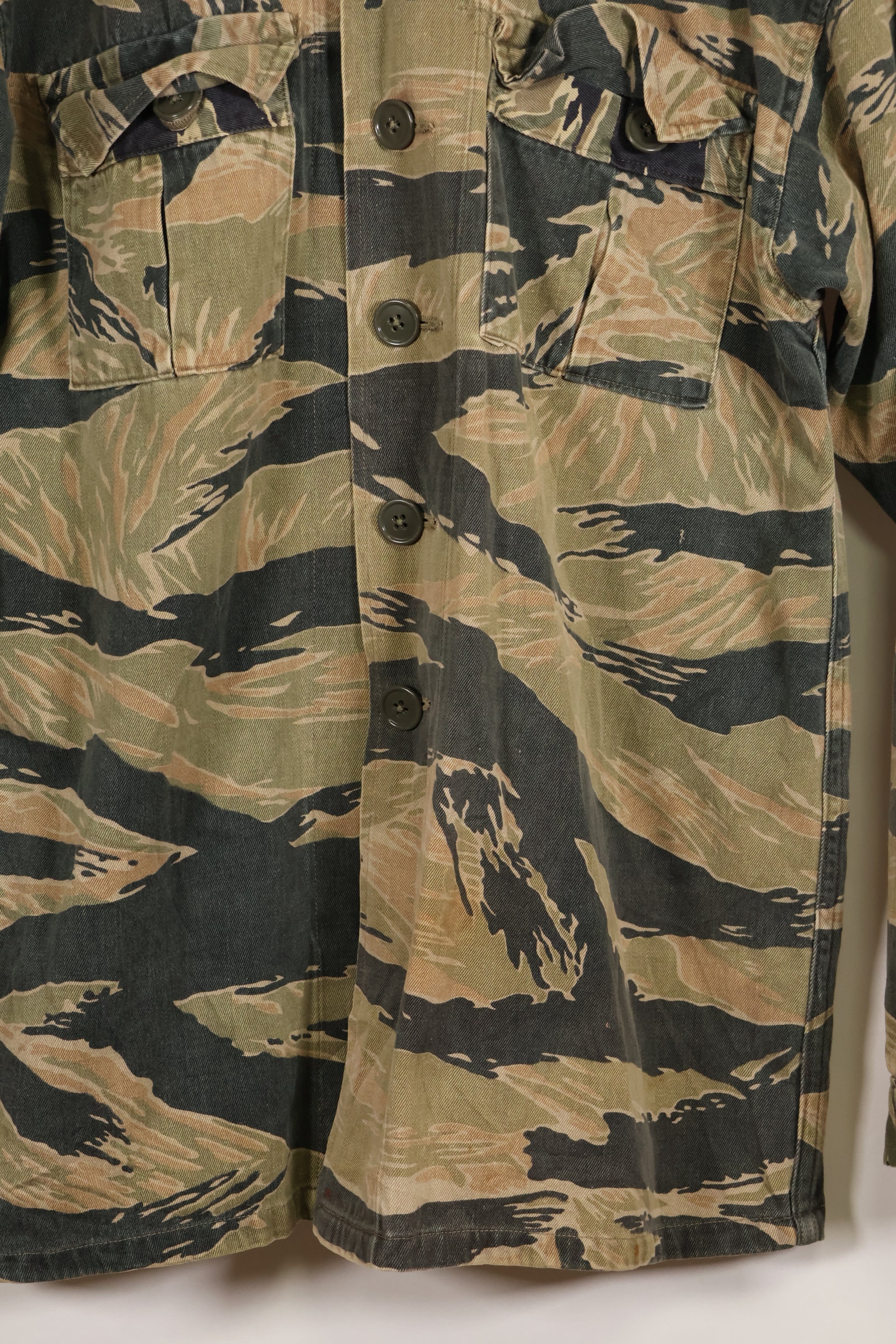 Estimated late 1960s-1970s locally made tiger stripe shirt, used.