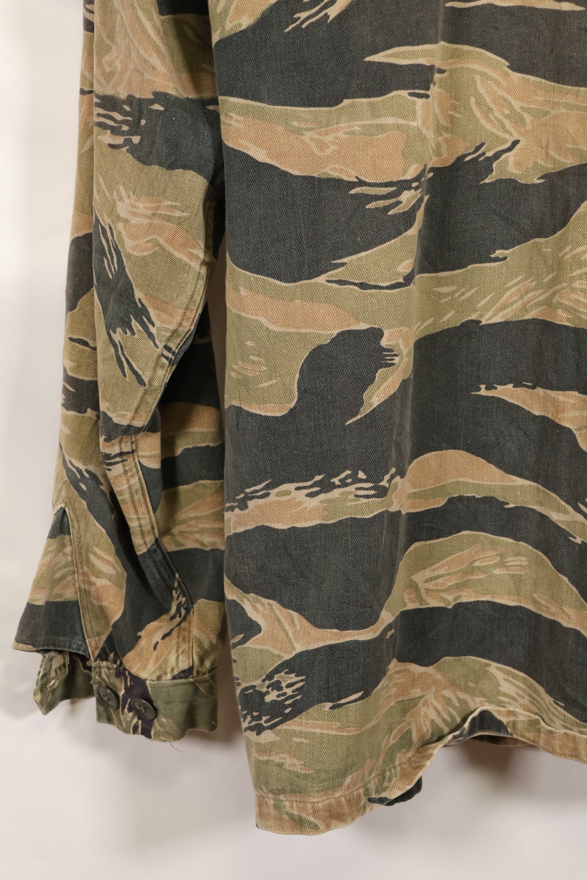 Estimated late 1960s-1970s locally made tiger stripe shirt, used.