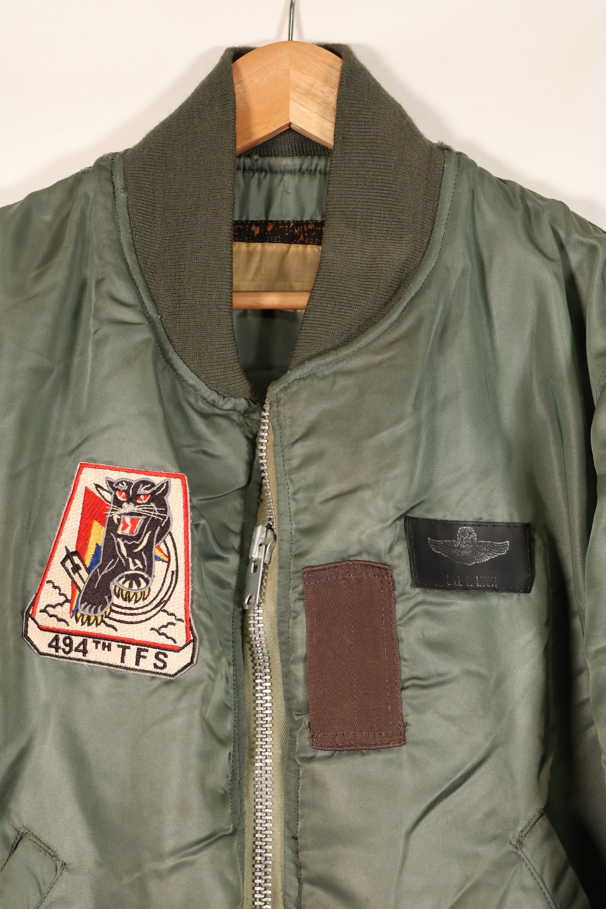 1950s, estimated size 40–42, U.S. Air Force B-15D flight jacket, modified with shearling, includes patches, used