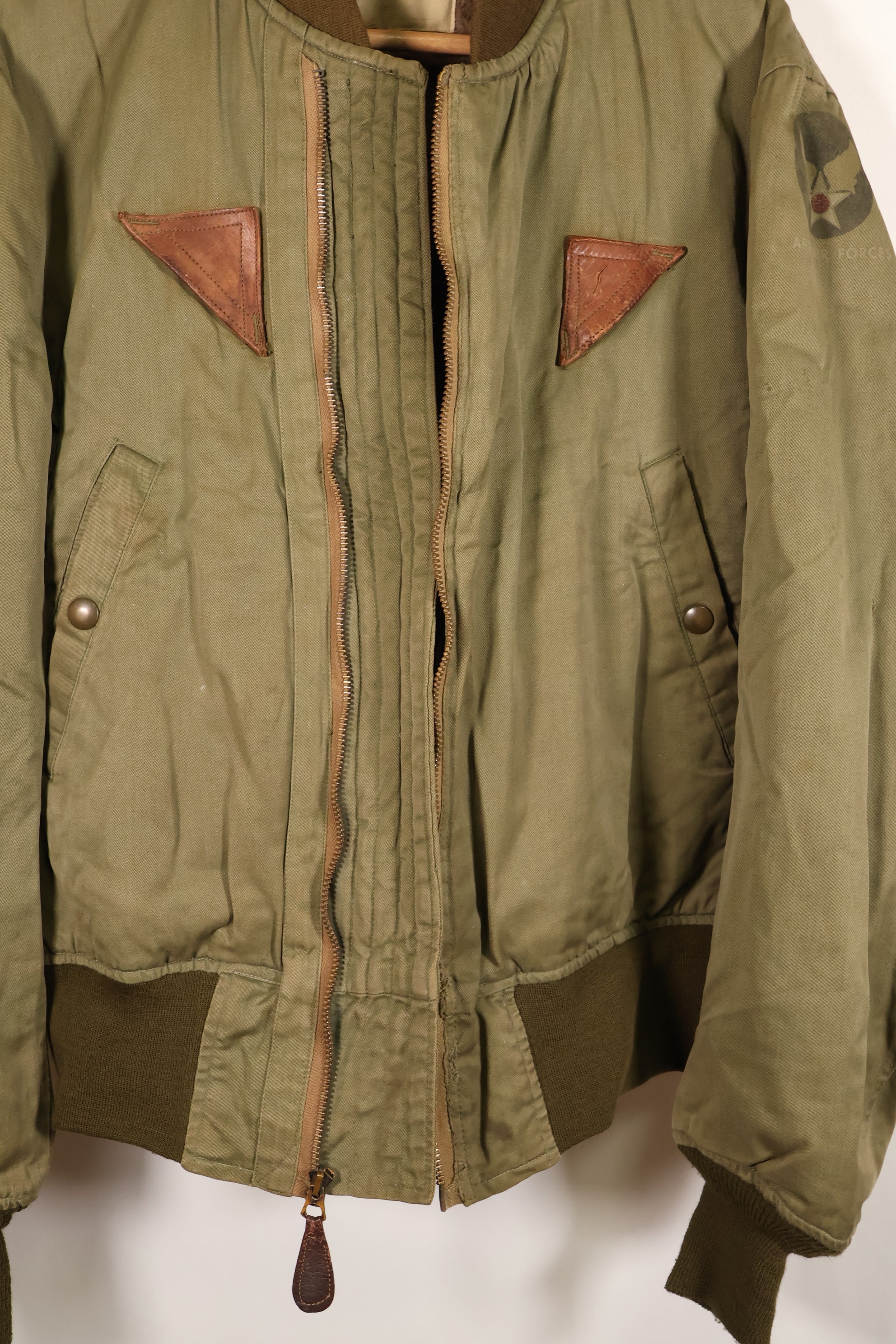 1940s, estimated age 38–40, U.S. Army Air Forces (USAAF) B-15A flight jacket, modified with shearling, used
