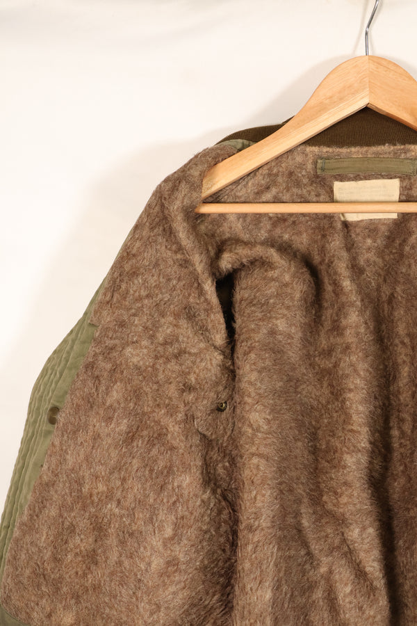 1940s, estimated age 38–40, U.S. Army Air Forces (USAAF) B-15A flight jacket, modified with shearling, used