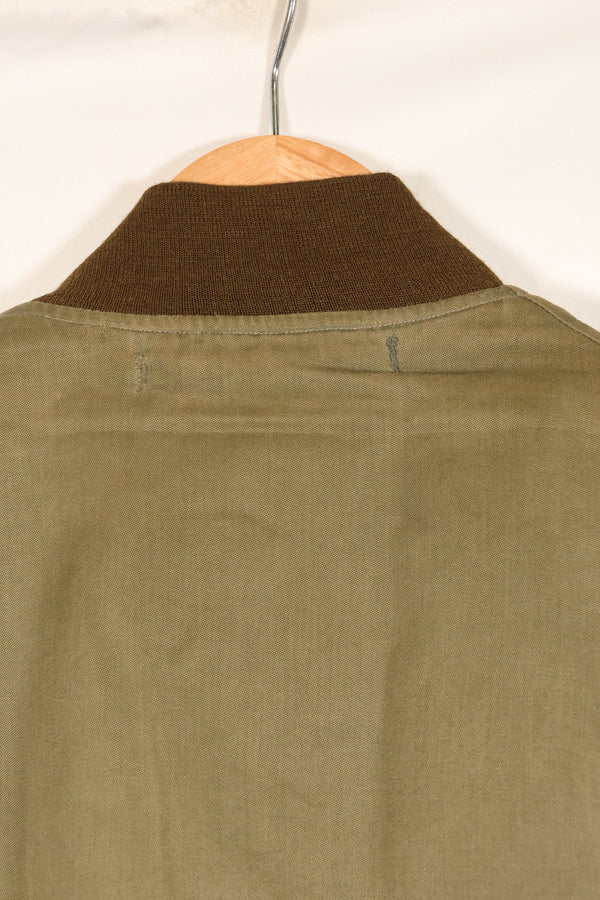 1940s, estimated age 38–40, U.S. Army Air Forces (USAAF) B-15A flight jacket, modified with shearling, used