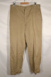 1960s, estimated 34-36 US Army cotton khaki pants, used.
