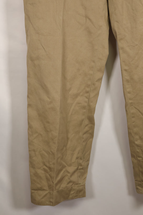 1960s, estimated 34-36 US Army cotton khaki pants, used.