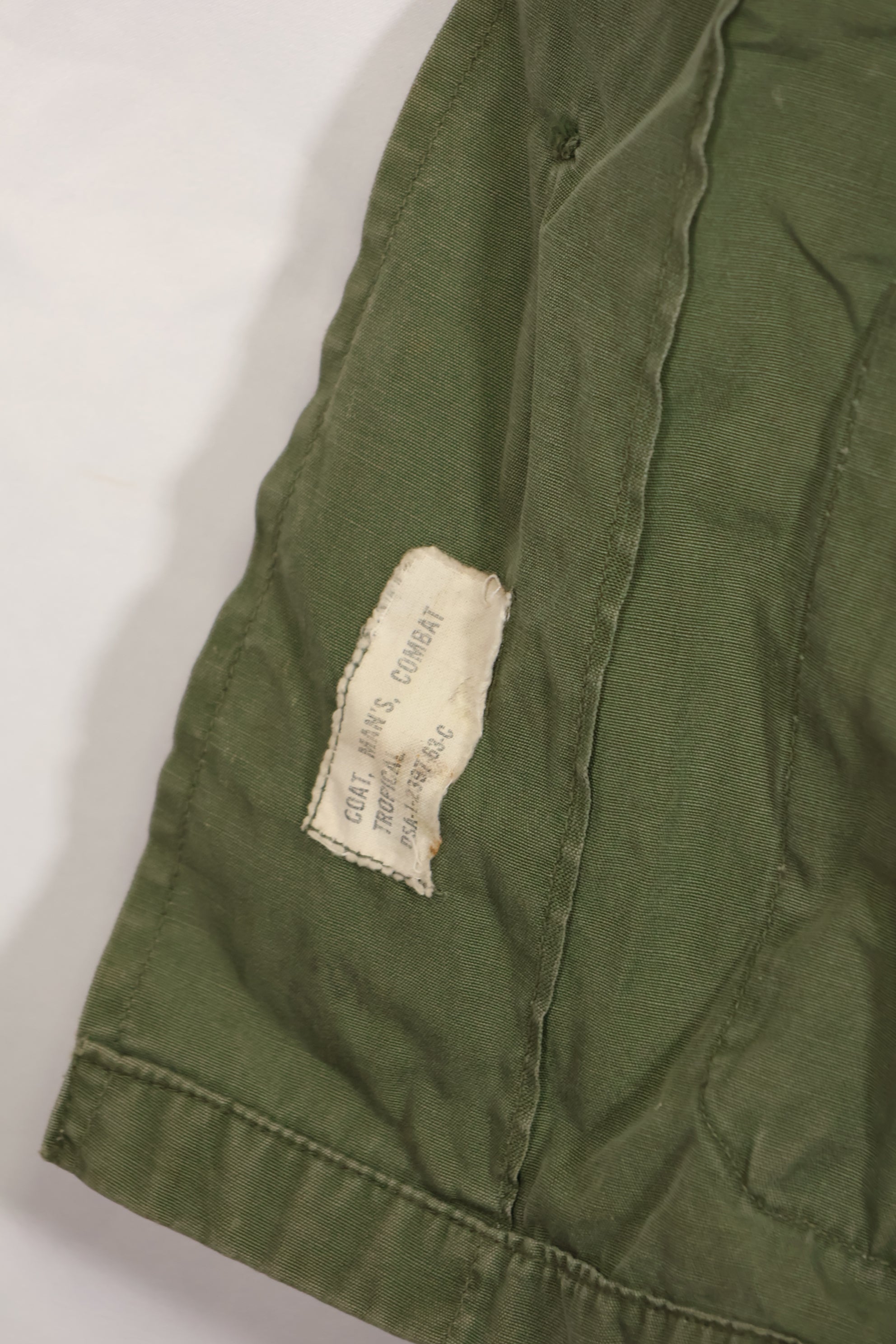 Real 1963 1st Model Jungle Fatigue Jacket, patch marks, faded.