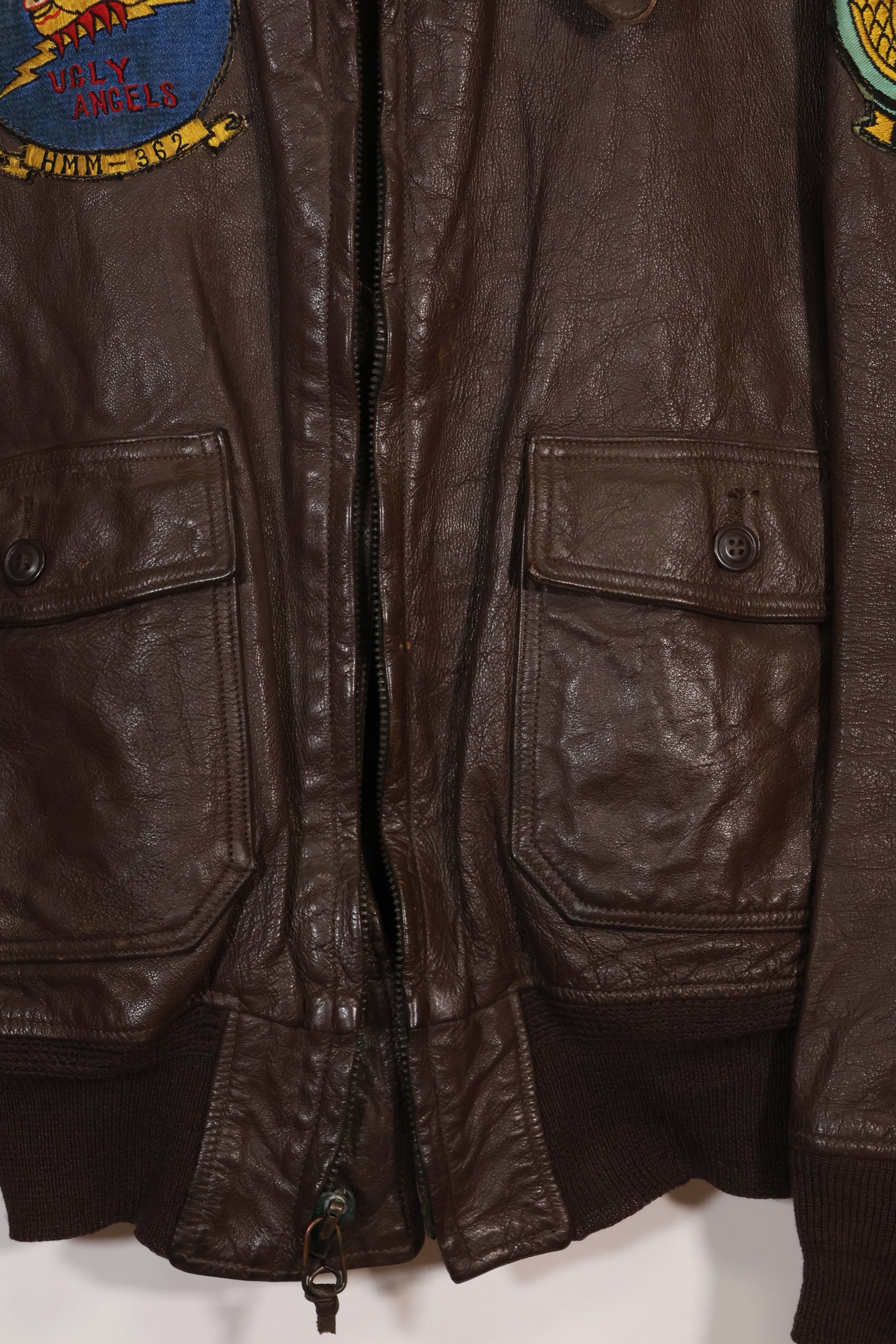 Early 1960s lot size 40 U.S. Marine Corps G-1 UGLY ANGENLS flight jacket, used.
