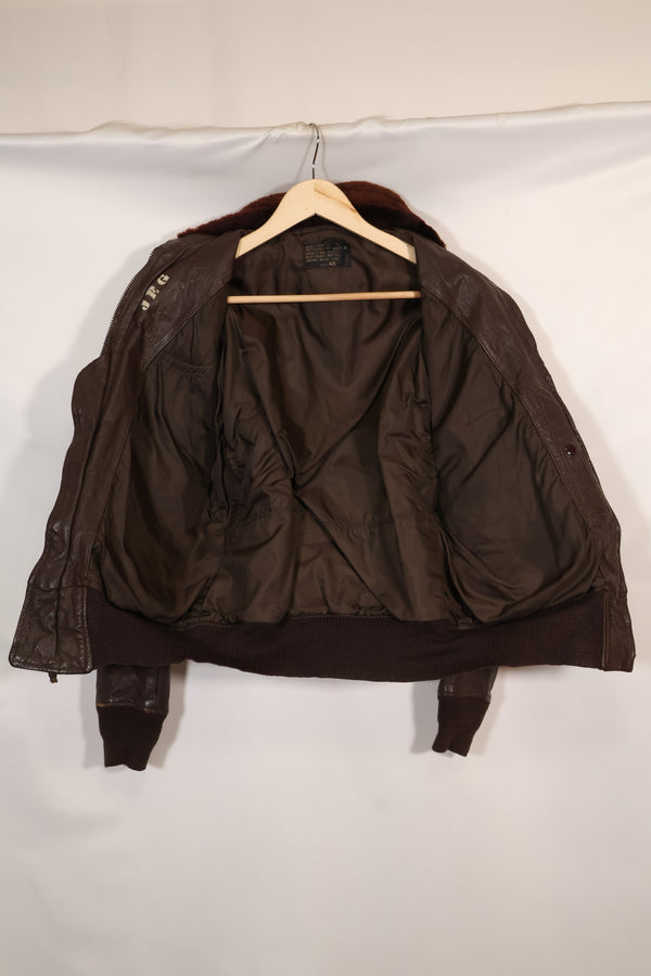 Early 1960s lot size 40 U.S. Marine Corps G-1 UGLY ANGENLS flight jacket, used.