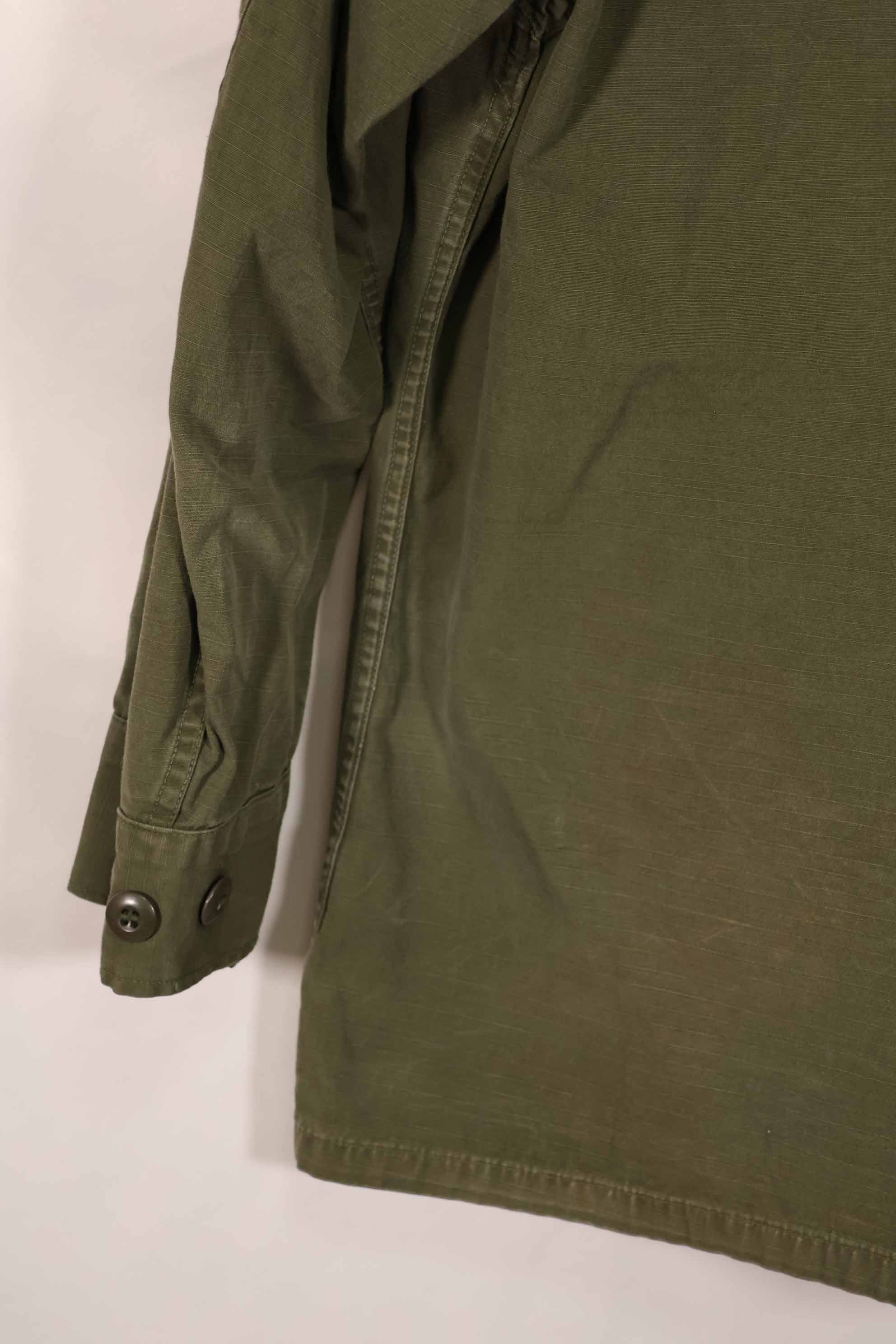 Real 1969 4th Model Jungle Fatigue Jacket with M-R 25th Infantry Division patch, used.