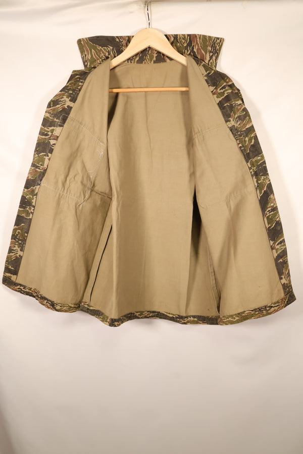 Late 1960s | Locally made | Estimated to be made in Vietnam or Thailand | Tiger-striped shirt | Used