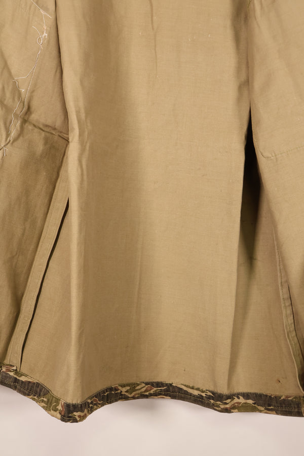 Late 1960s | Locally made | Estimated to be made in Vietnam or Thailand | Tiger-striped shirt | Used