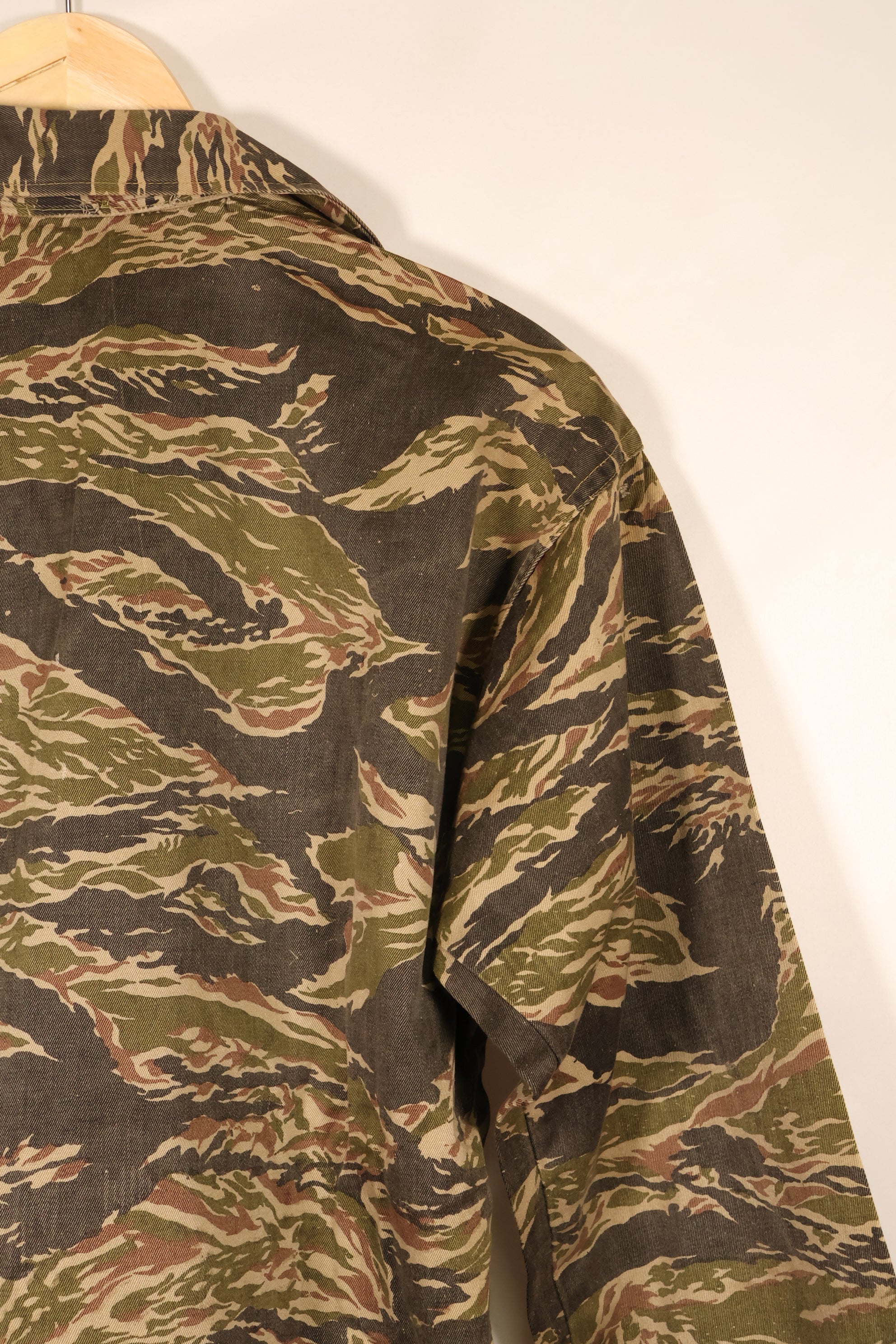 Late 1960s | Locally made | Estimated to be made in Vietnam or Thailand | Tiger-striped shirt | Used