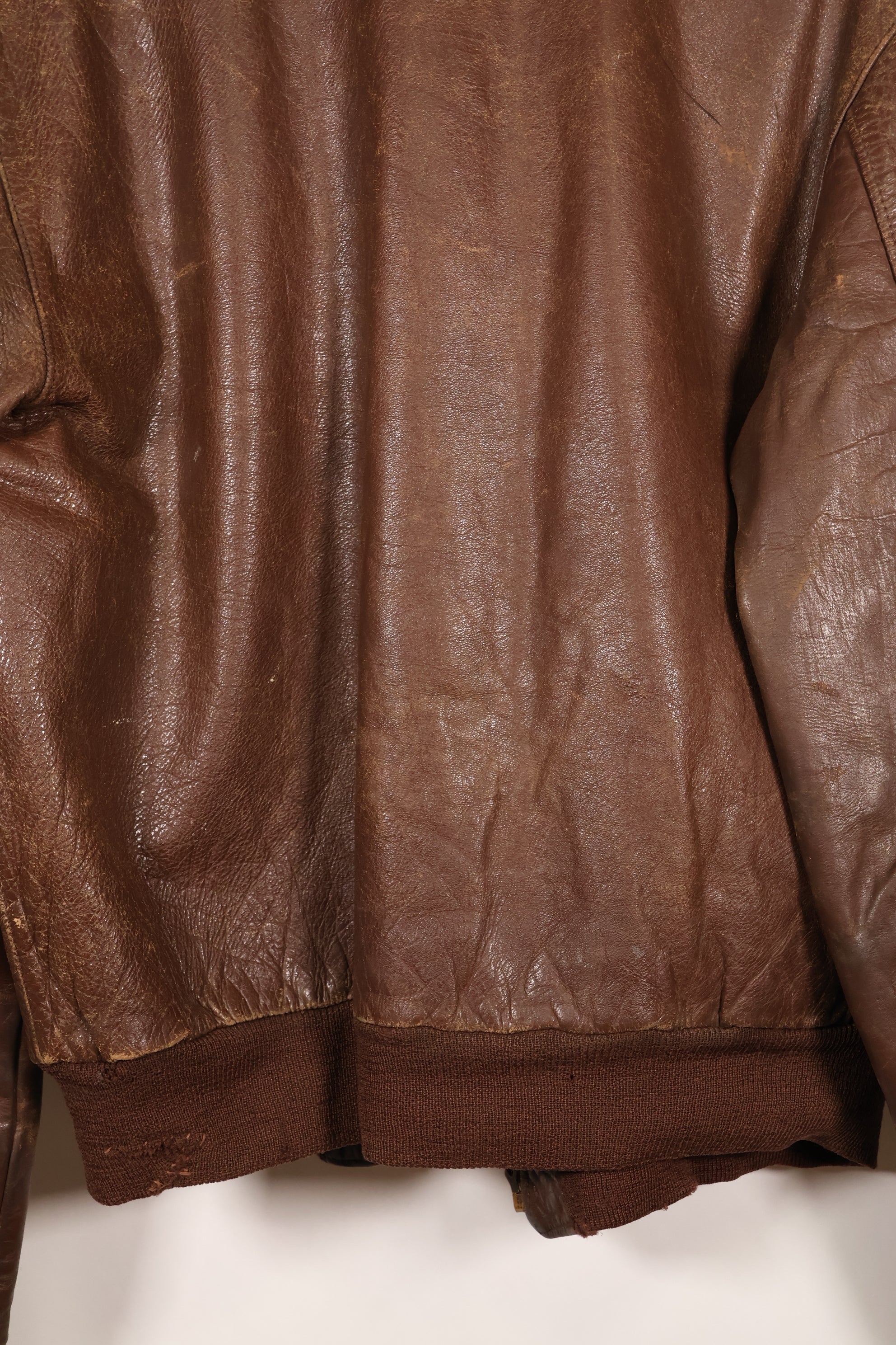 1940s size 42 WWII U.S. Army Air Corps USAAF A-2 flight jacket with name, used.