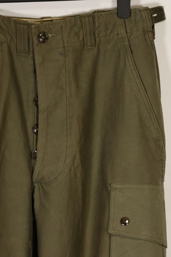 Real U.S. Army M45 pants with additional pocket modification, used.