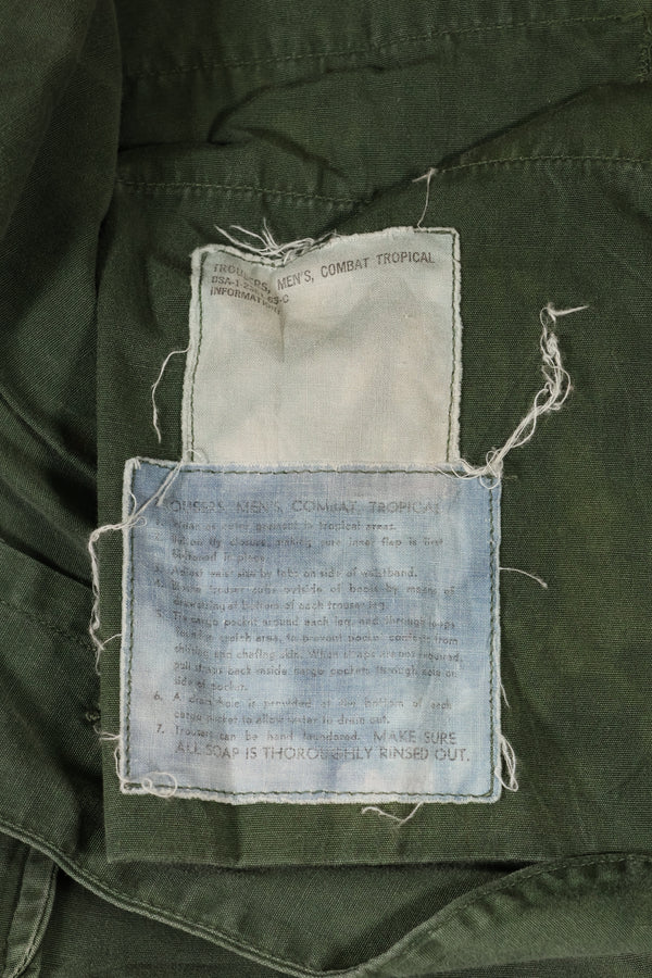 1963 contract, estimated S-L 1st Model Jungle Fatigue pants, dyed, CRC release, faded, used.