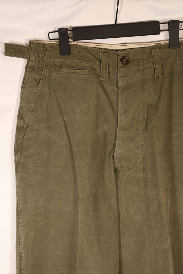 Real late 1940s - early 1950s M45 OD cotton field pants, used, strong signs of use.