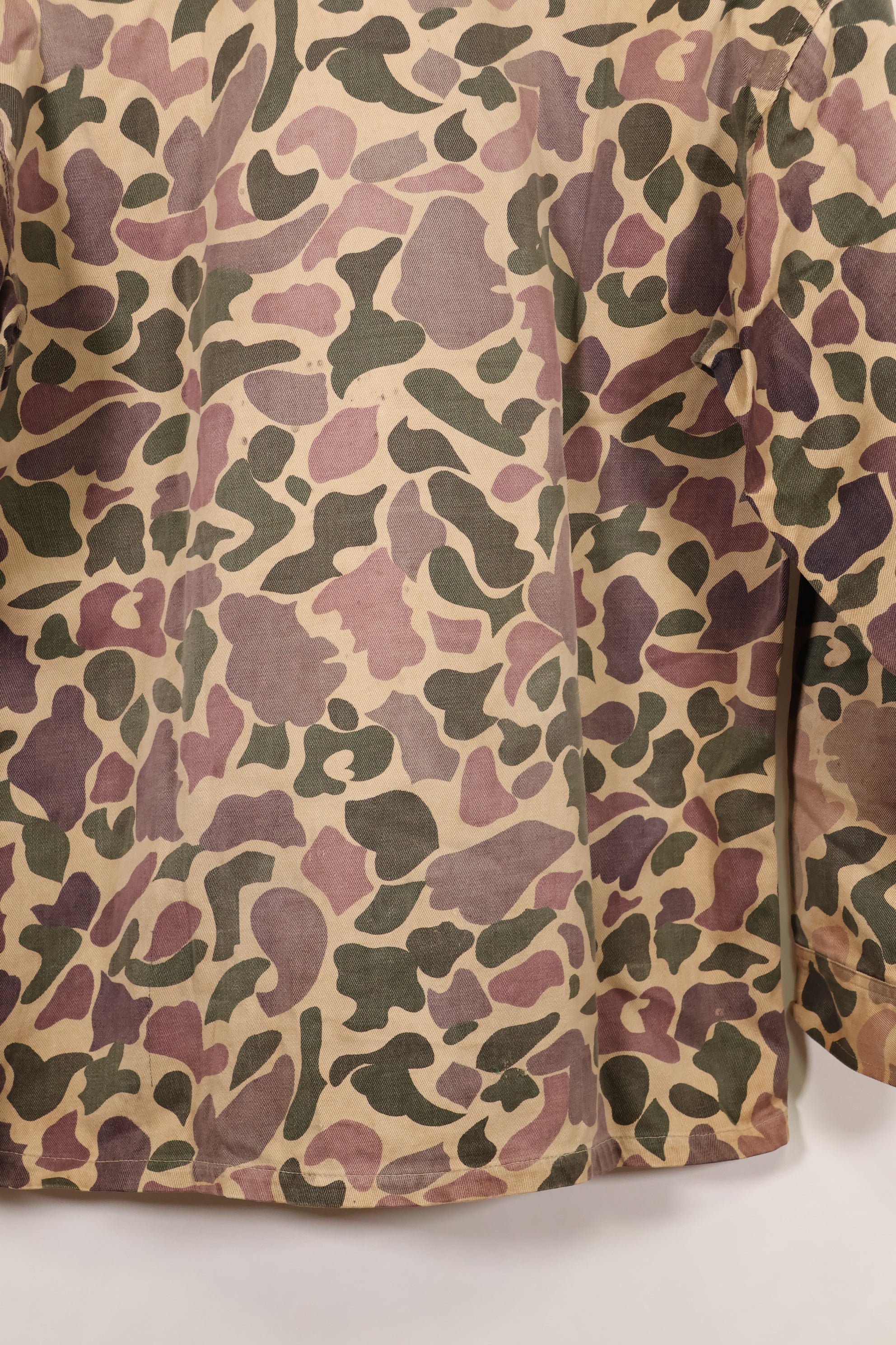 Early 1960s, faded, estimated A-L CIDG, beogum camouflage Asian cut shirt.