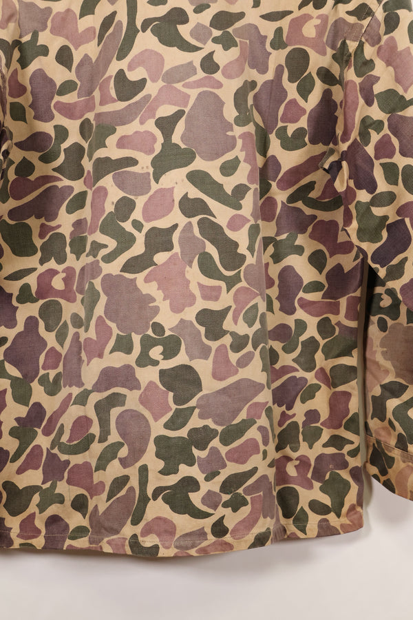Early 1960s, faded, estimated A-L CIDG, beogum camouflage Asian cut shirt.