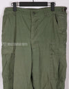 Real Poplin jungle fatigue pants, faded, used.