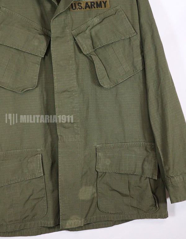 Real 1968 4th Model Jungle Fatigue Jacket, stained, patch included.