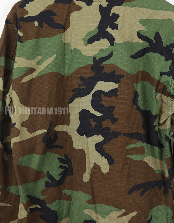 Real U.S. Army Woodland Camouflage Jacket, 2007, with patches.