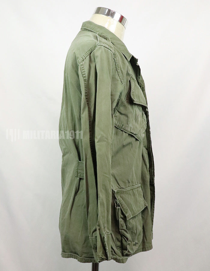 Real 2nd model jungle fatigues jacket, worn, scratched, faded.