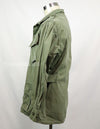 Real 2nd model jungle fatigues jacket, worn, scratched, faded.