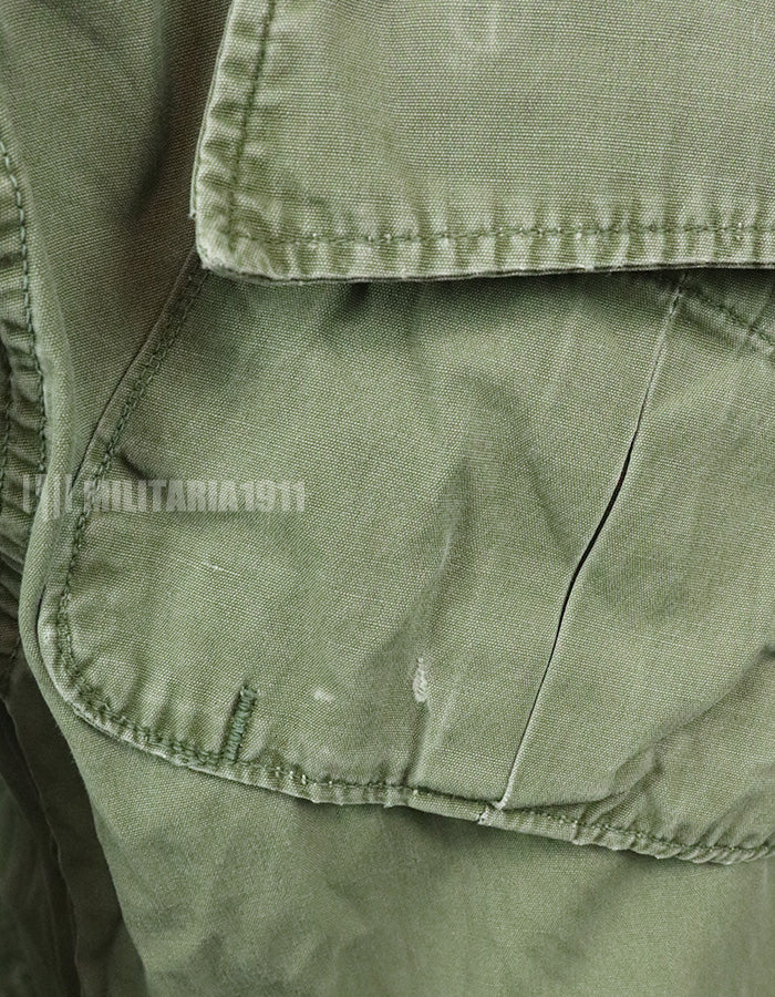 Real 2nd model jungle fatigues jacket, worn, scratched, faded.