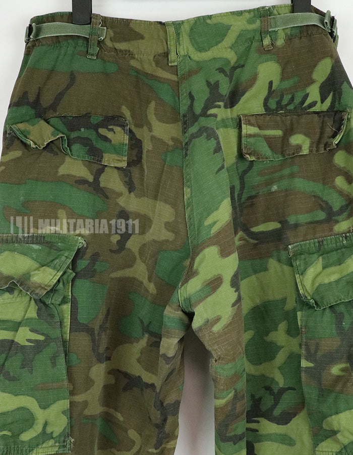 Original U.S. Army USMC 1969 ERDL Jungle Fatigue Pants, green leaf, used. Stained